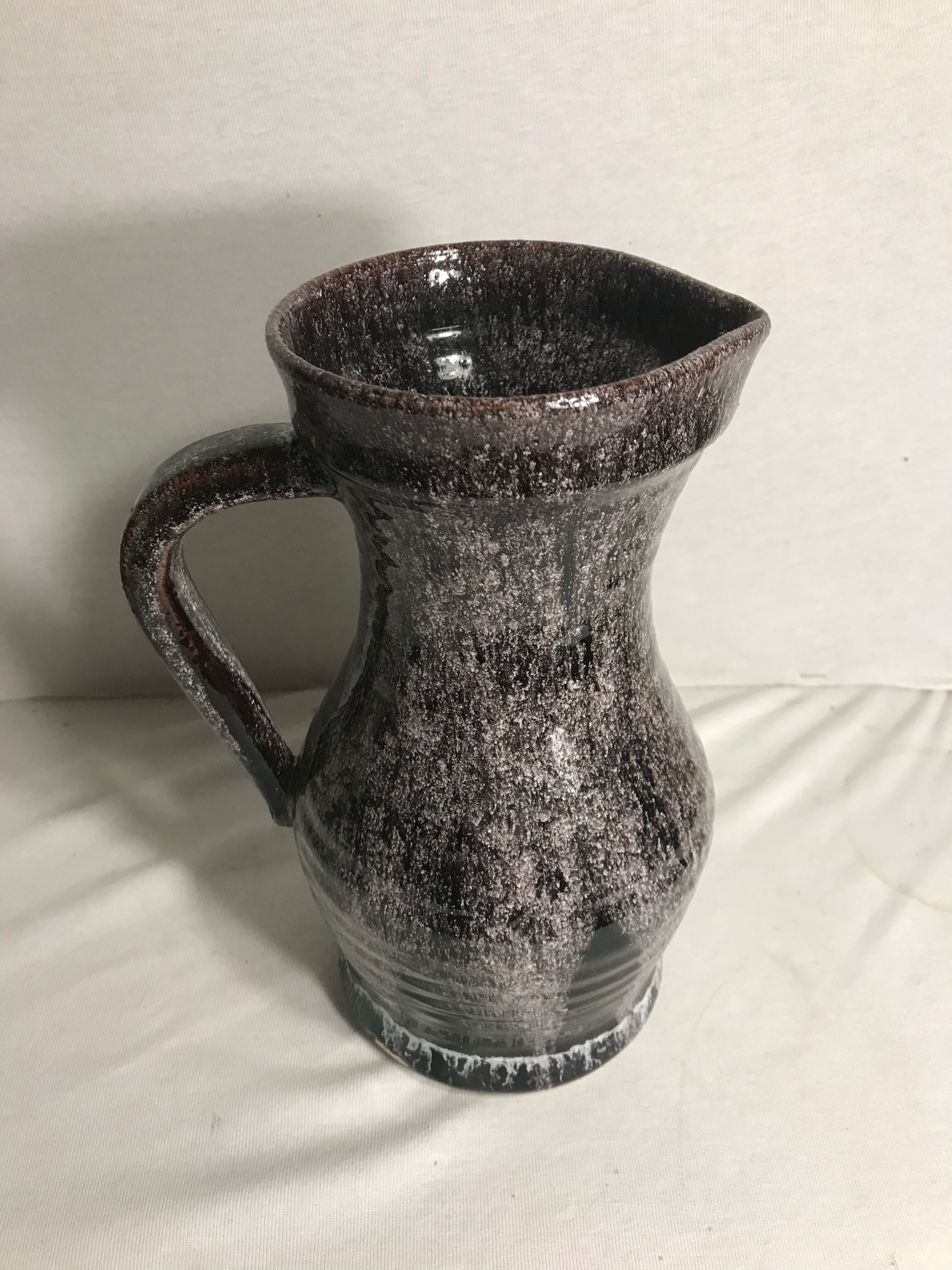 Old ceramic accolay jug, grey-black