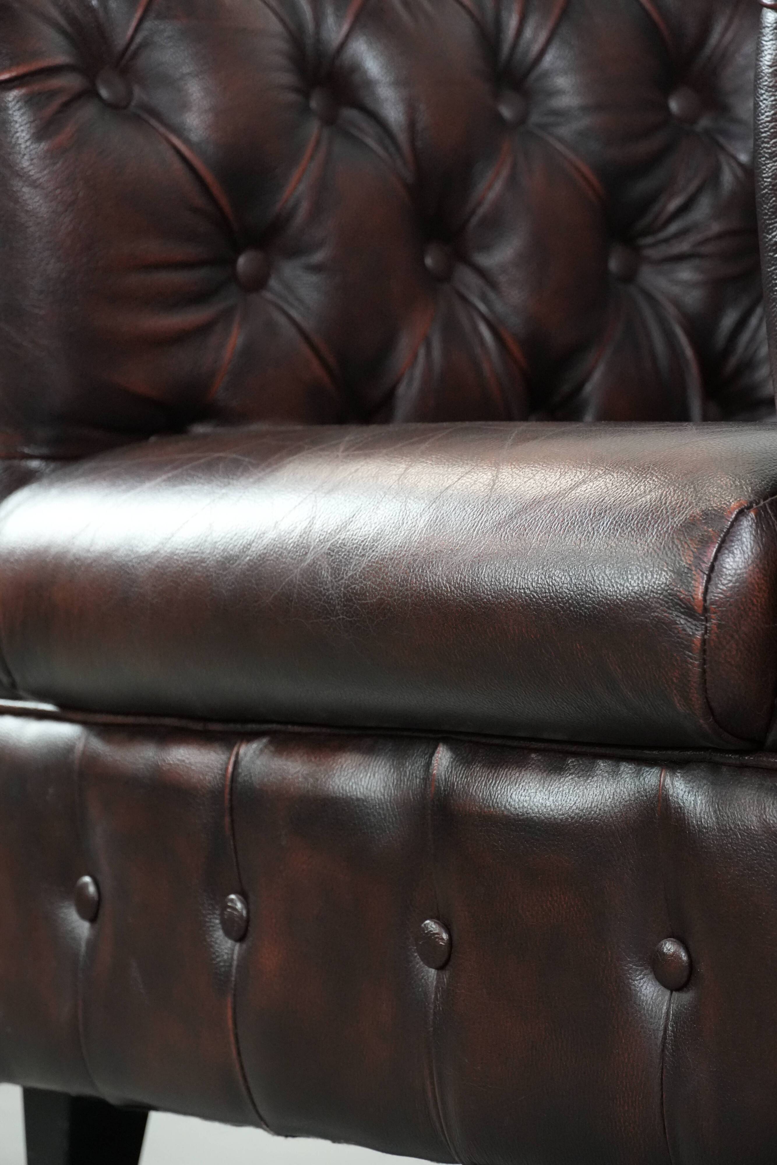 Classic English-style Chesterfield club armchair in cowhide leather