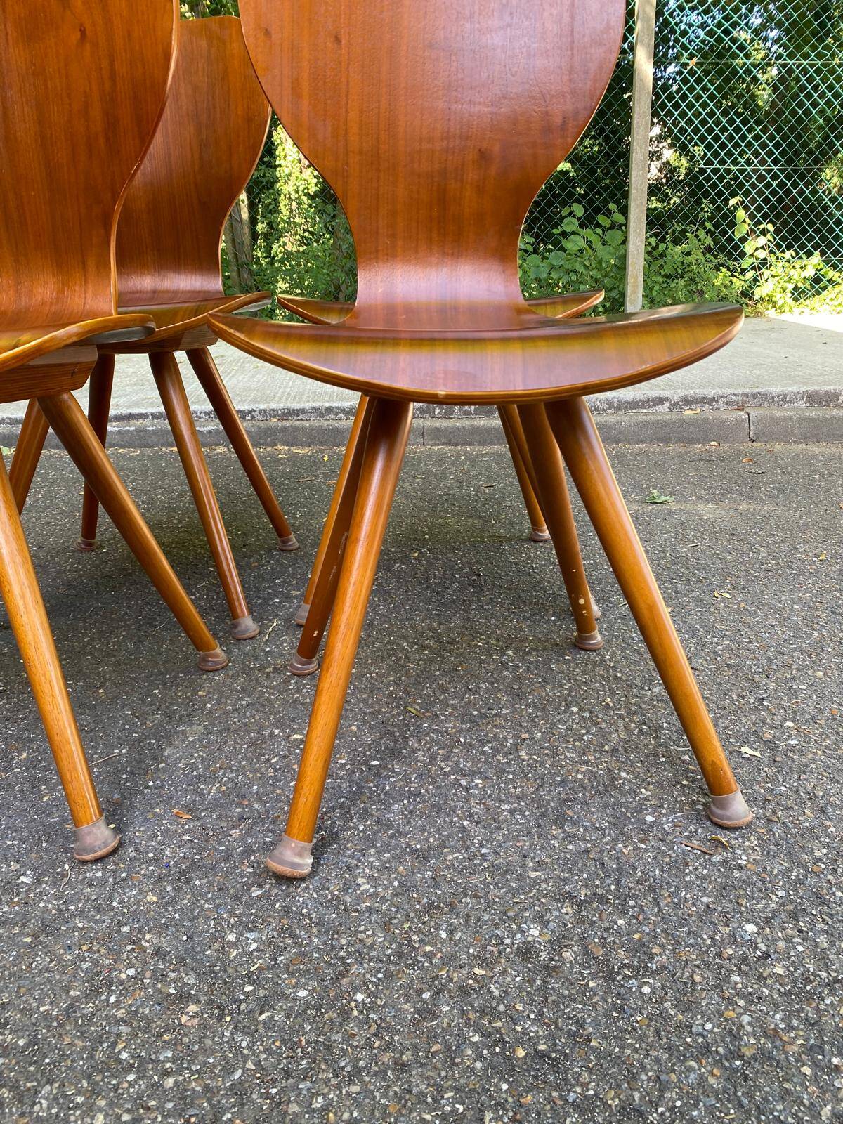 4 vintage Scandinavian dining chairs in curved walnut.