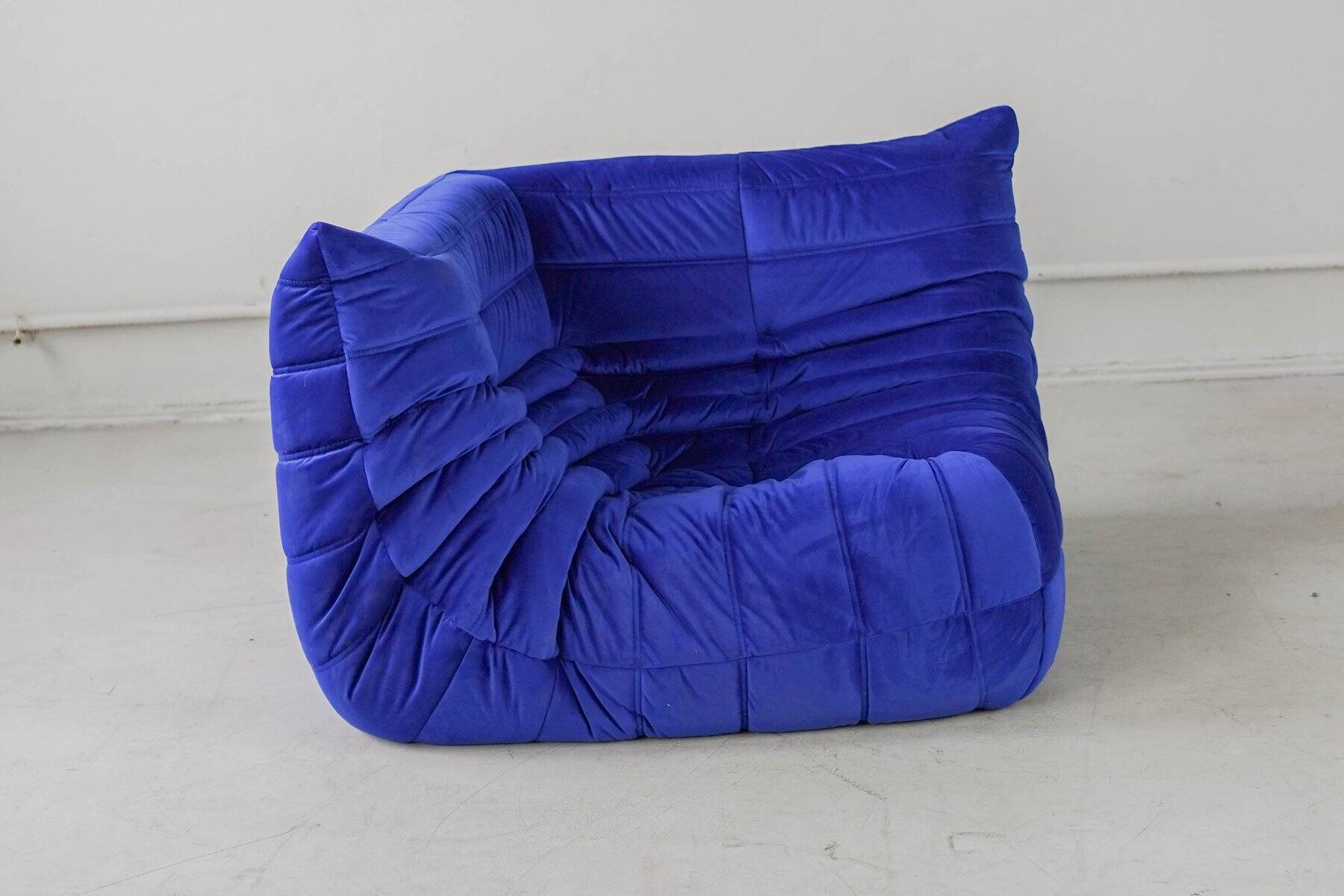 Togo corner chair in blue velvet by Michel Ducaroy for Ligne Roset