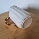 White and gold porcelain milk jug
