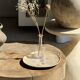 Petrified wood catchall or dish in beige with several grey spots in the centre.