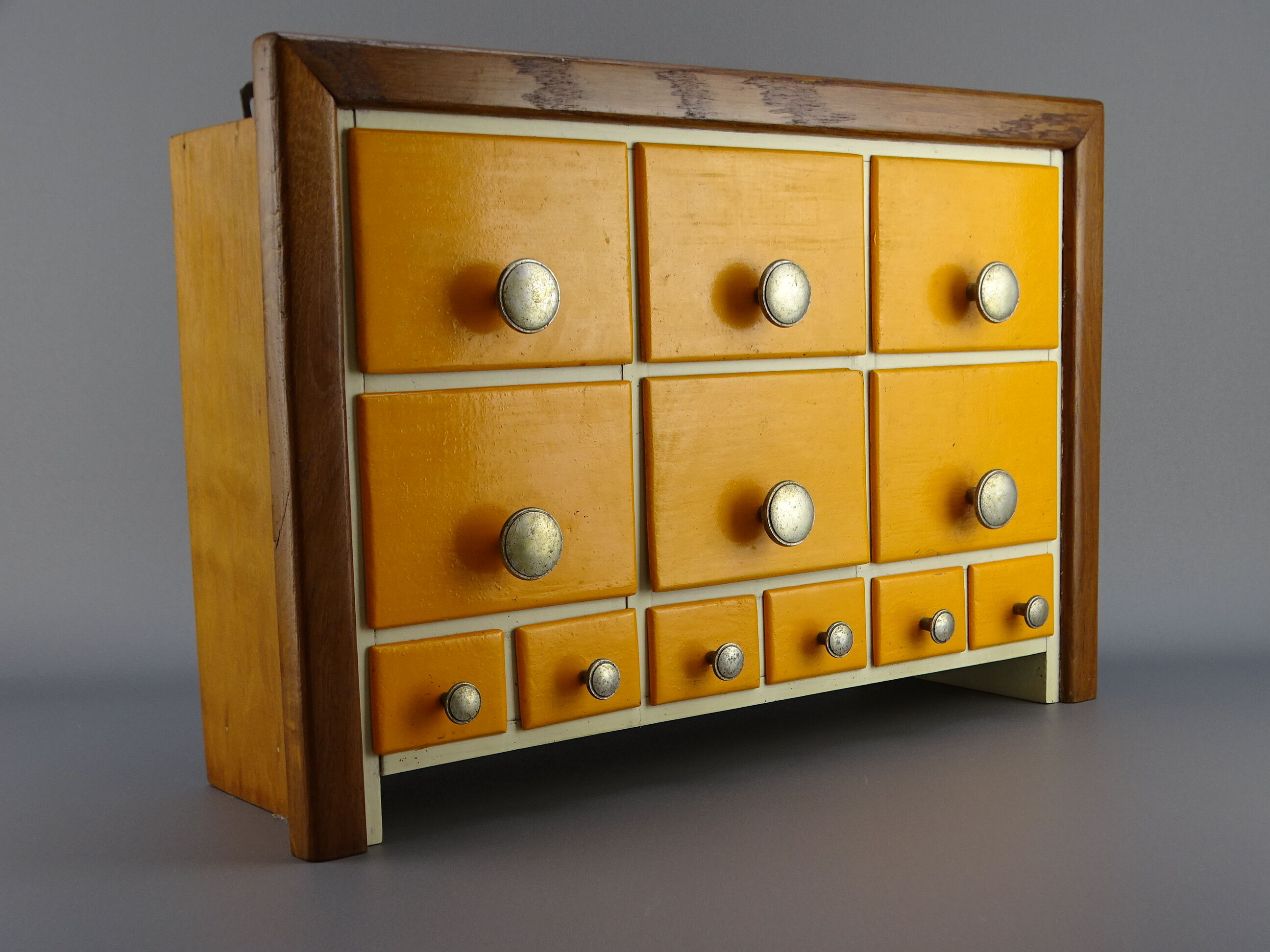 Cabinet loom shelf with drawer layette style
