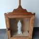 Old religious statuary display case