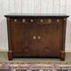 Empire buffet from the early 19th century in mahogany with a black marble top.