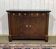 Empire buffet from the early 19th century in mahogany with a black marble top.