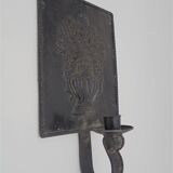 Wall-moving candlestick