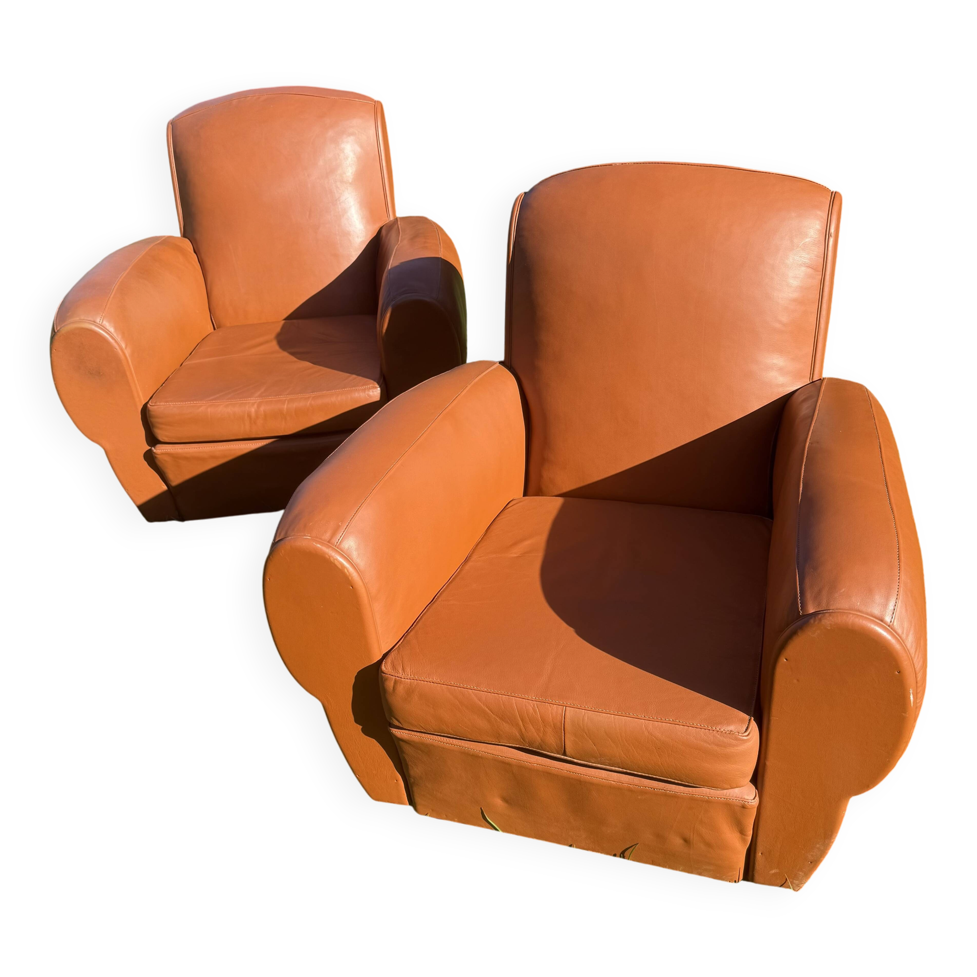 pair of leather clubs