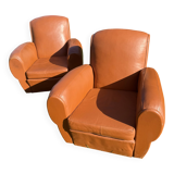 pair of leather clubs