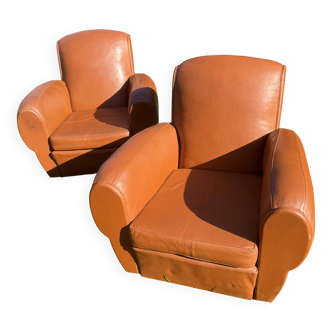 pair of leather clubs