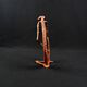 Dogon Nommo bronze statue with brown patina and red highlights, mid-20th century