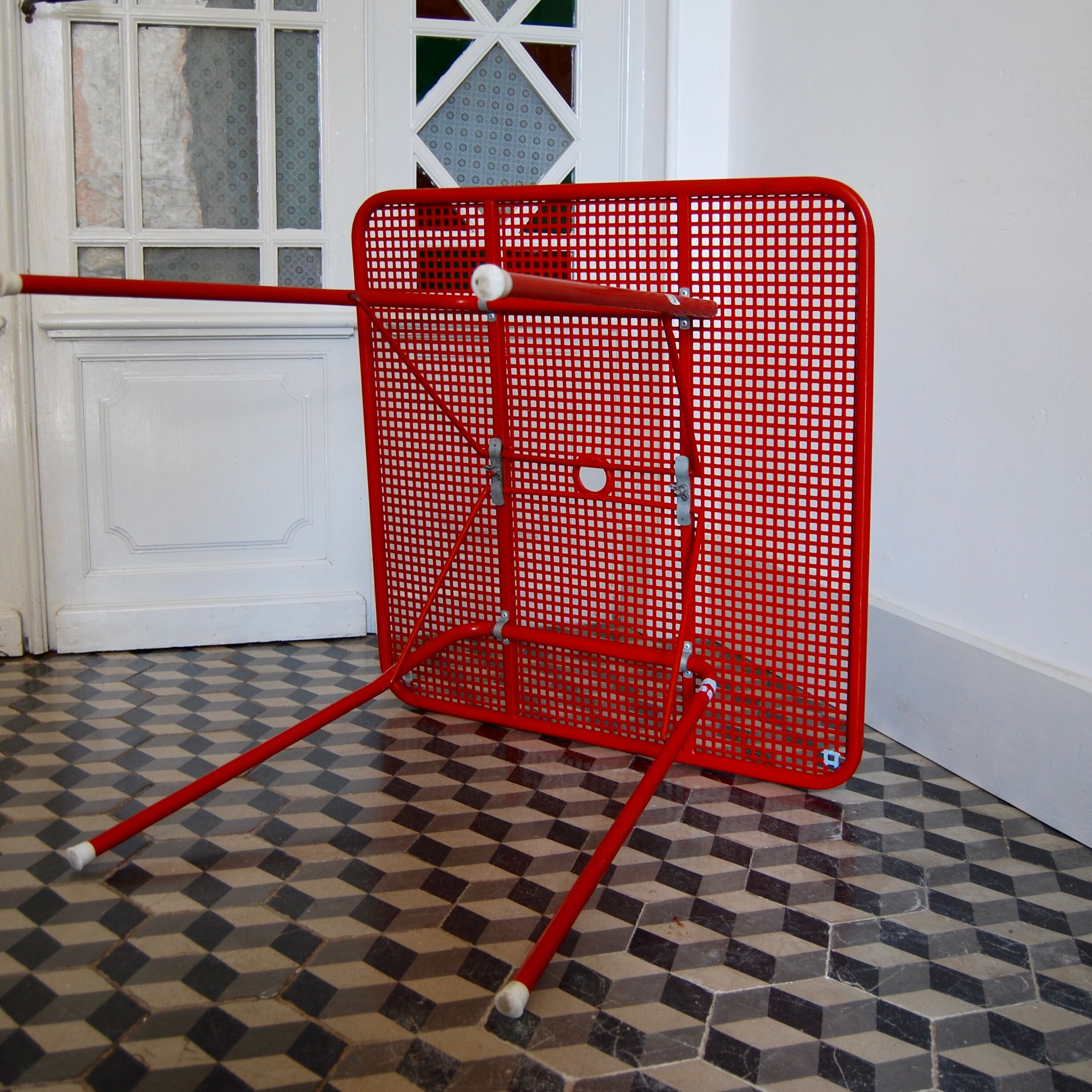 Red metal folding table Malaval type
