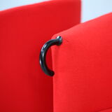 Pair of red Arflex armchairs. Italy, circa 1980