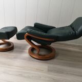 Mid - century leather armchair with footrest with relax function from himolla