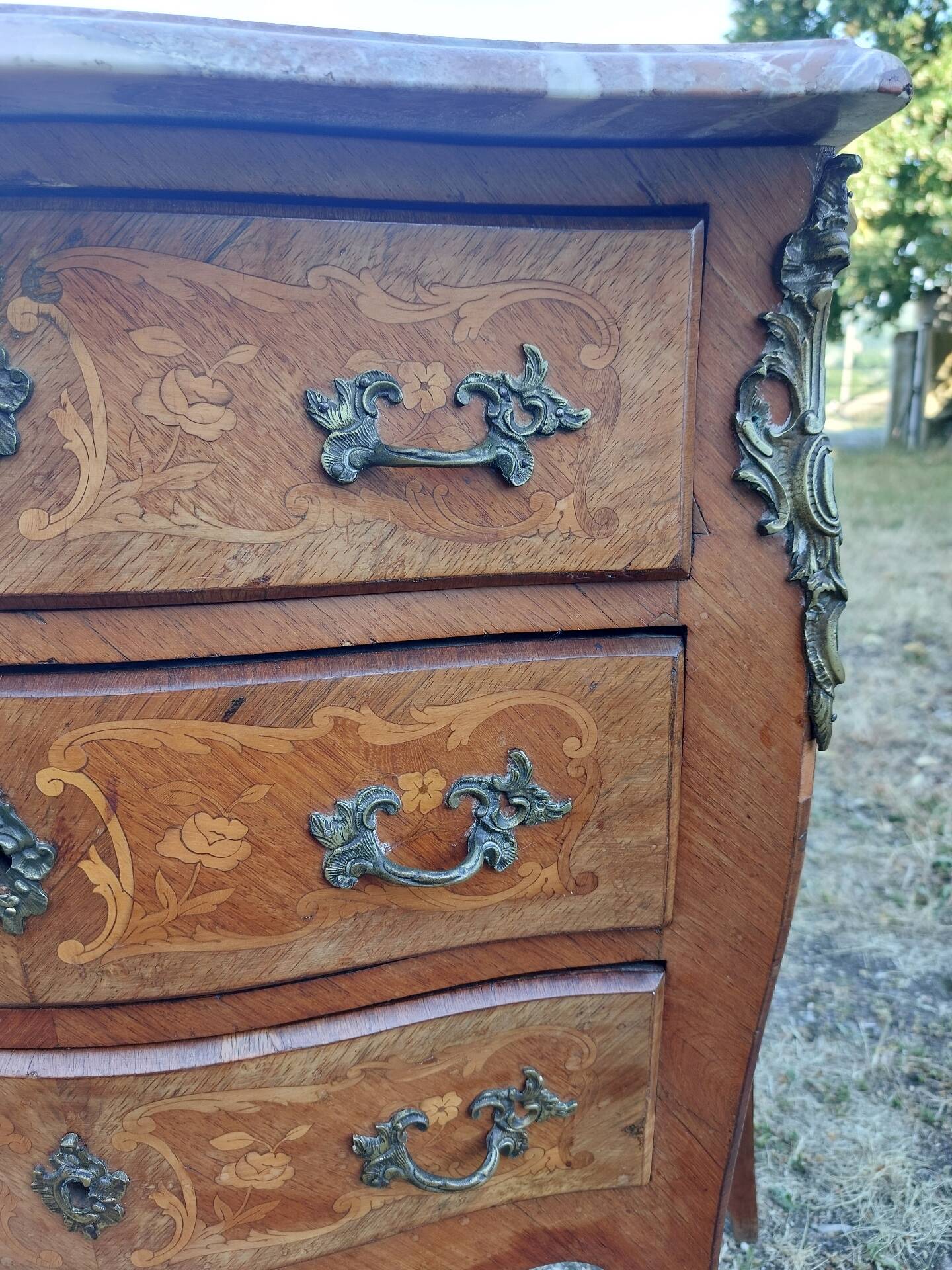 Curved commode in rosewood, Louis XV style.