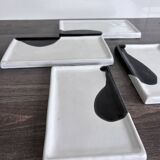 Lot of 4 rectangular glazed terracotta plates.