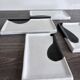 Lot of 4 rectangular glazed terracotta plates.