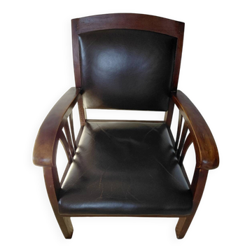 Colonial style wooden armchair