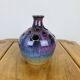 Vase with purple ceramic flowers