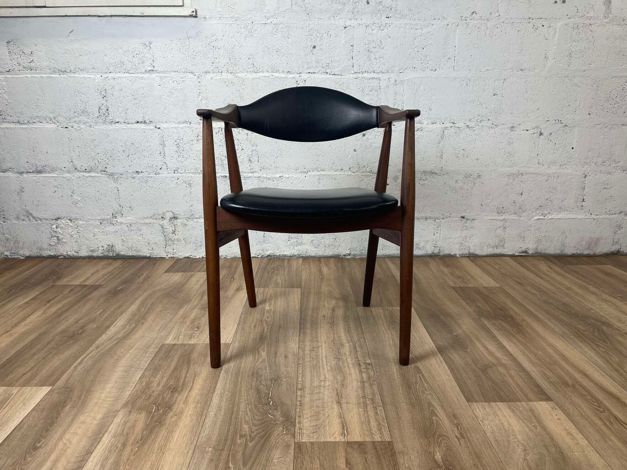 Vintage Scandinavian armchair in teak and black skai, 60s