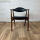 Vintage Scandinavian armchair in teak and black skai, 60s