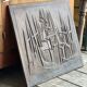 Cast iron plaque signed