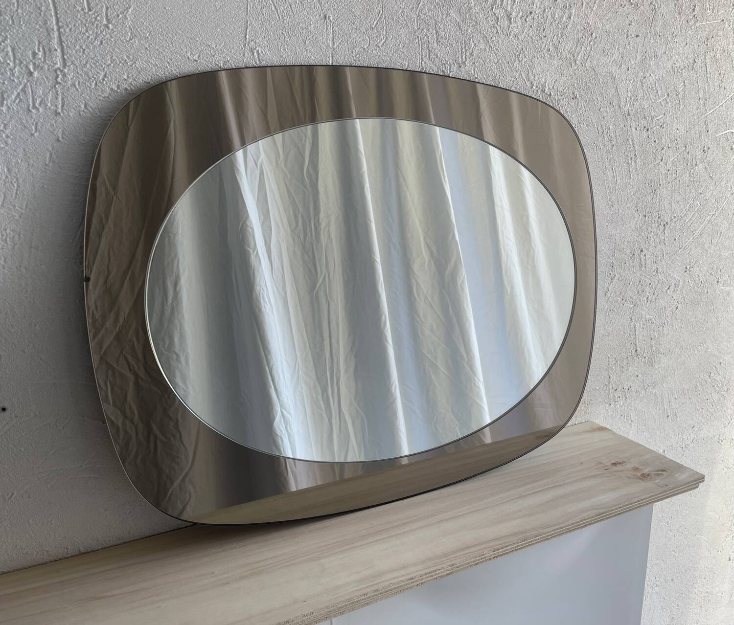 Miroir en verre fumé 70’s space age