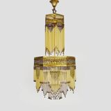 Art Nouveau style bronze chandelier with yellow and mauve pendants, 11 lights. 1960s