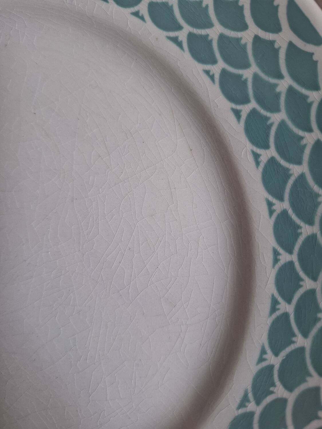 Mismatched antique flat plates in earthenware.