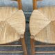Paire de chaises paillées vintage en merisier