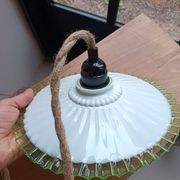 Portable lamp with green and white glass suspension