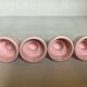 Four double pink candlesticks