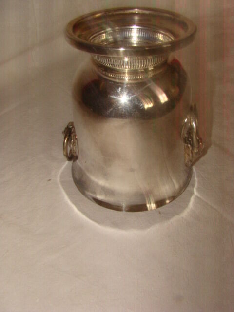 silver-plated ice bucket "with lion heads" from the 1970s