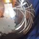Vintage globe suspension in amber glass, chiseled floral decoration - 80s
