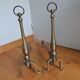 Brass or bronze andirons