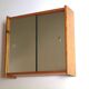 Wooden wall shelf with sliding mirror doors, 1970s