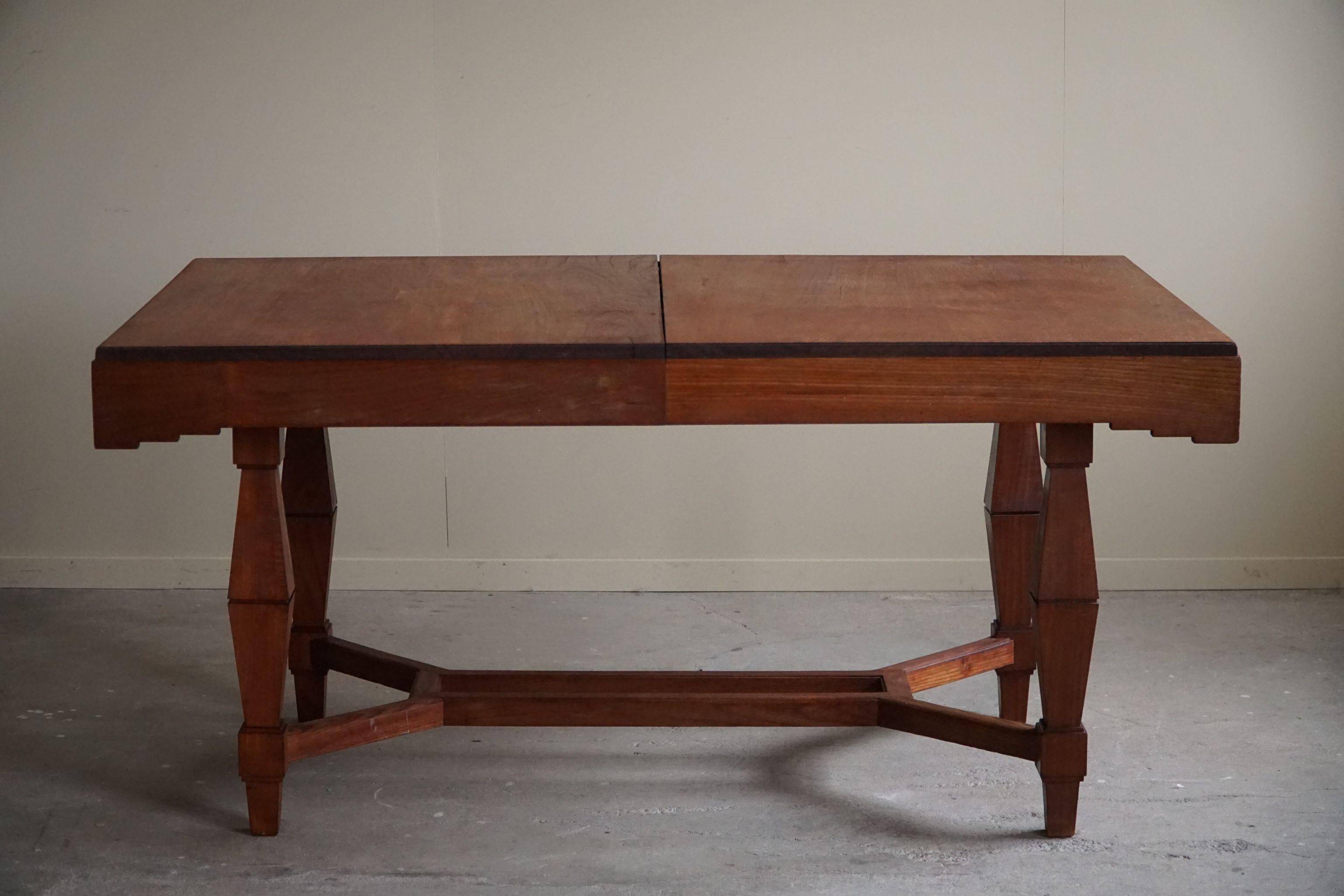 Art Deco dining table in teak, with butterfly extension, Danish cabinetmaker, 1940s.