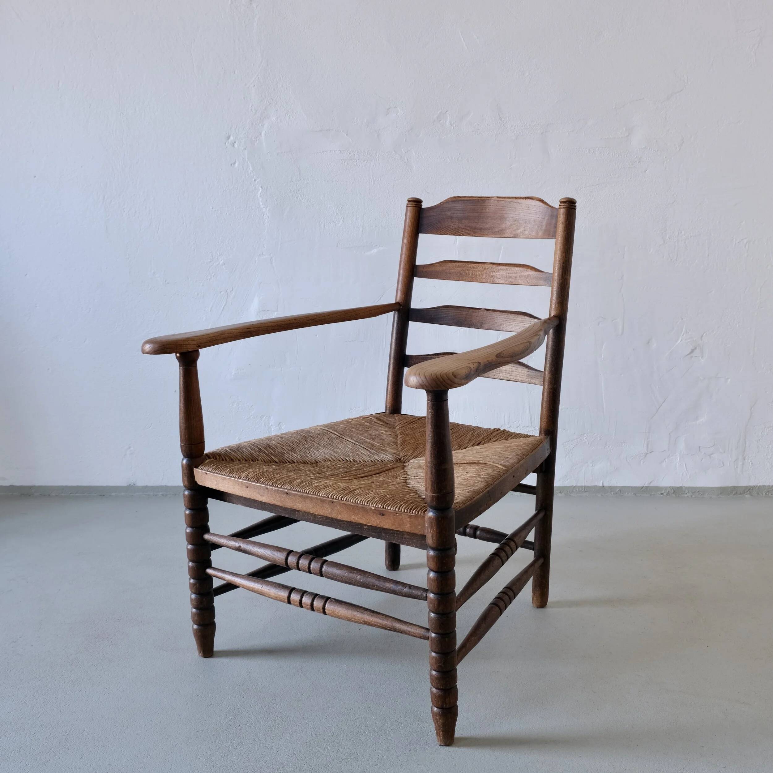 Rustic bobbin rush seat low armchair | Netherlands | 1940s