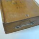 Wooden storage box marked "with a golden hammer"