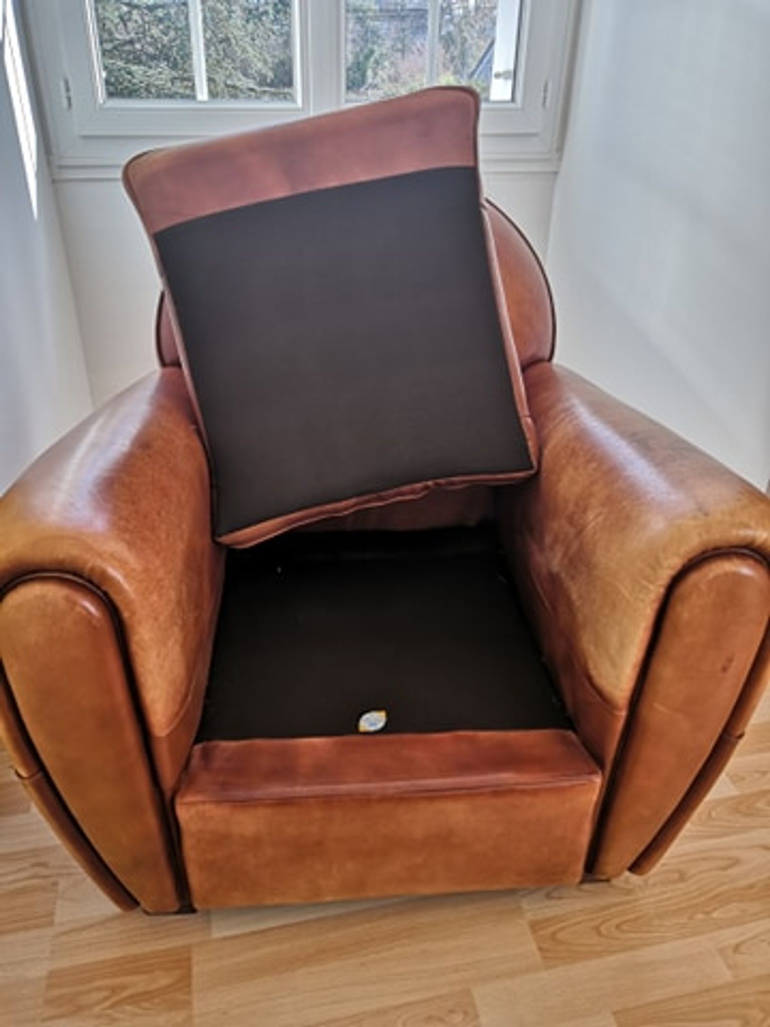 Tawny vintage leather club chair