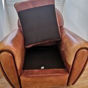 Tawny vintage leather club chair