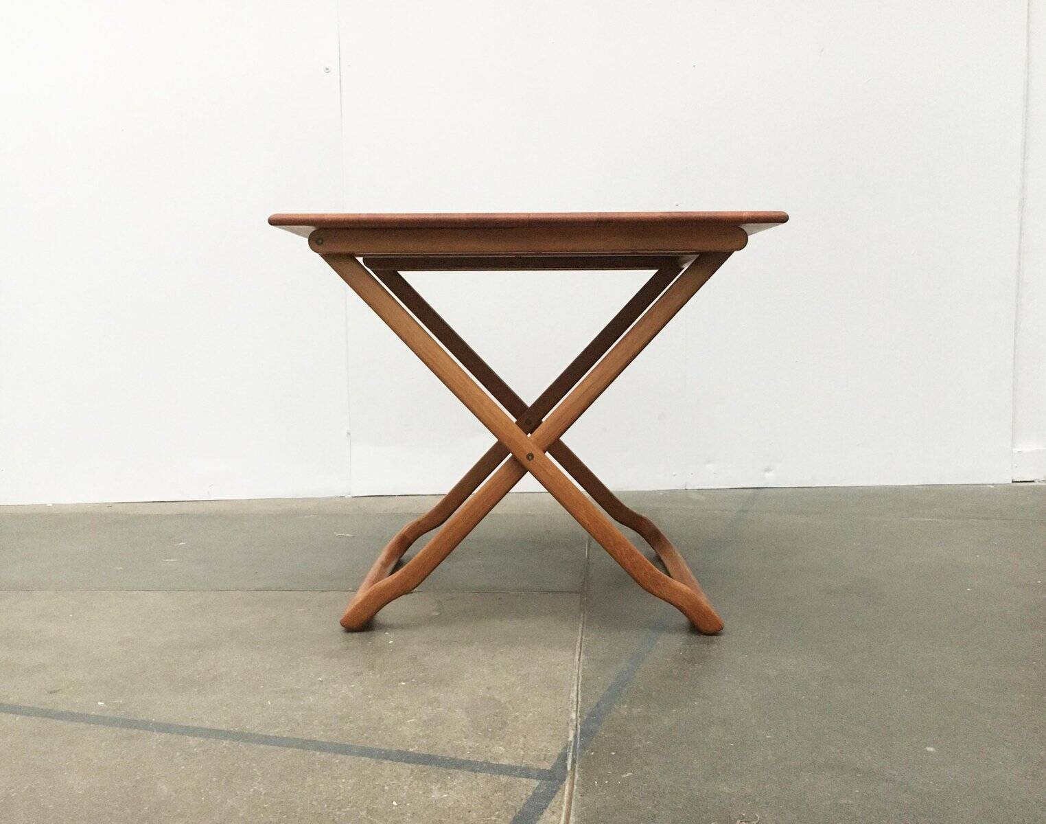 Danish folding table in teak from the mid-century by Juul Kristensen.