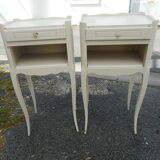 Pair of white lacquered bedside tables