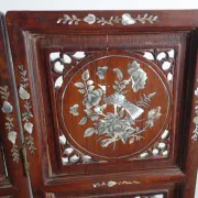 Asian screen in carved wood and mother-of-pearl marquetry.