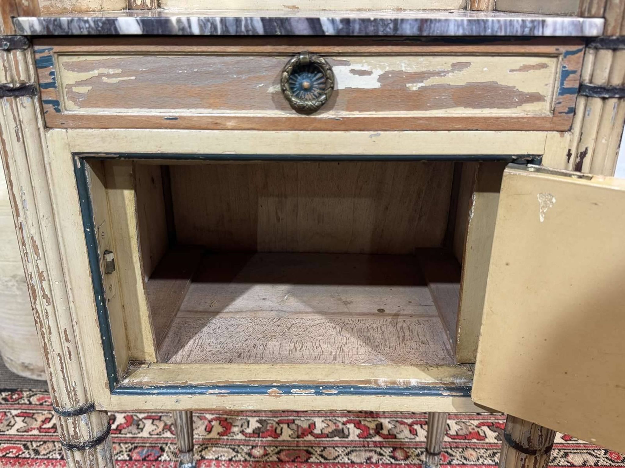Beech bedside table painted with a marble top in Louis XVI style from the late 19th century.