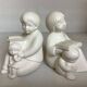 Pair of bookends with a matte white glaze for children.