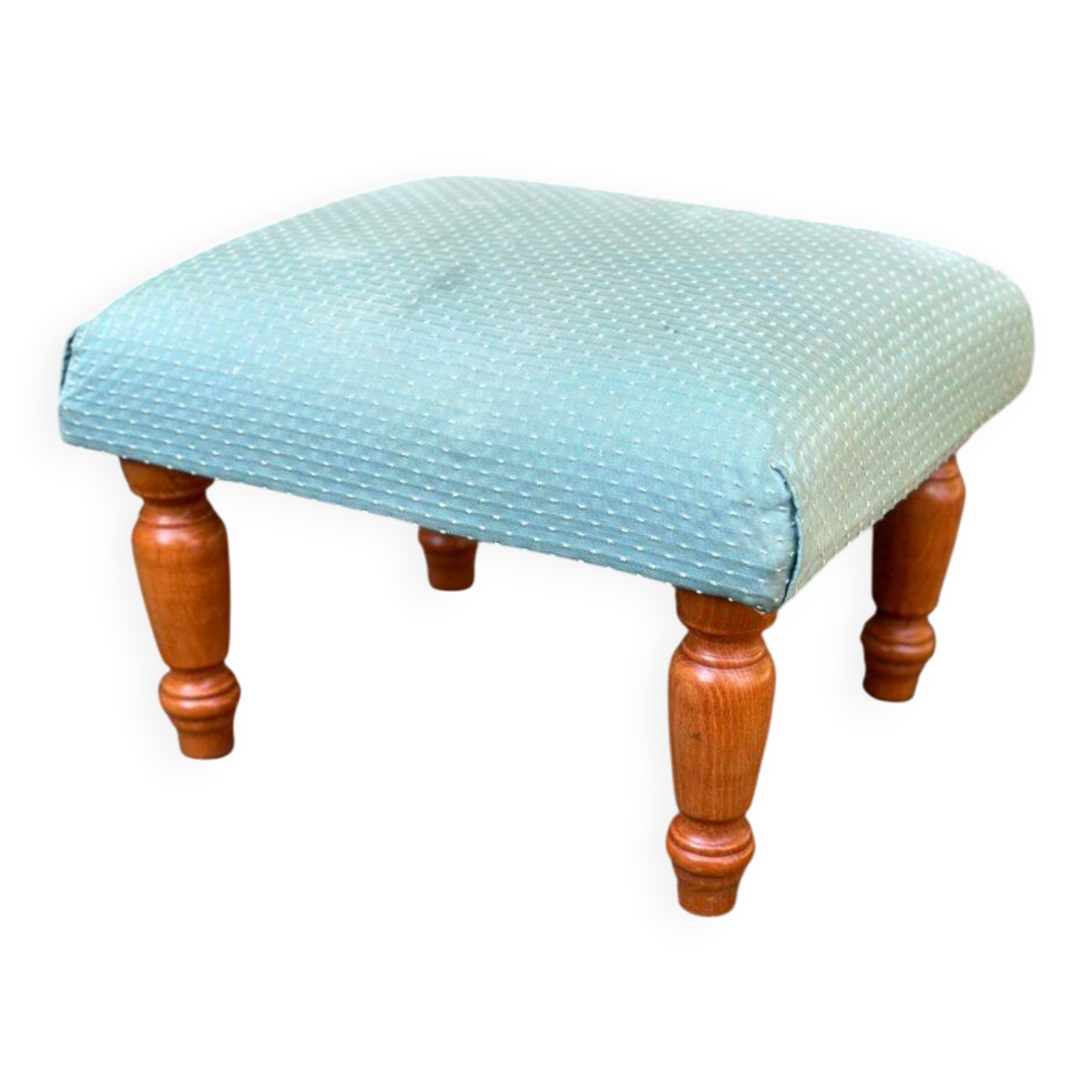 Vintage footstool made of solid wood and blue fabric.