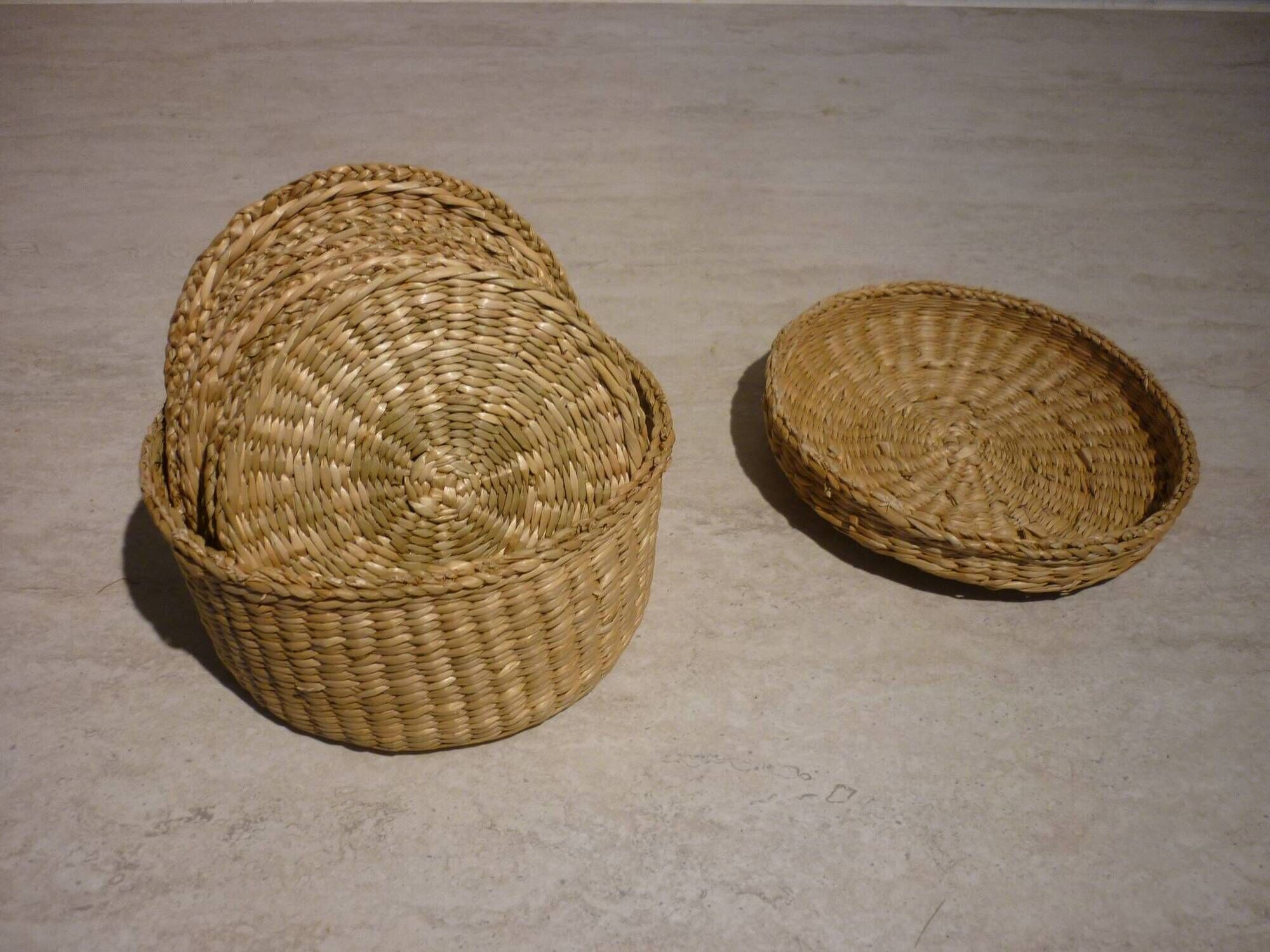 10 coasters in their wicker box