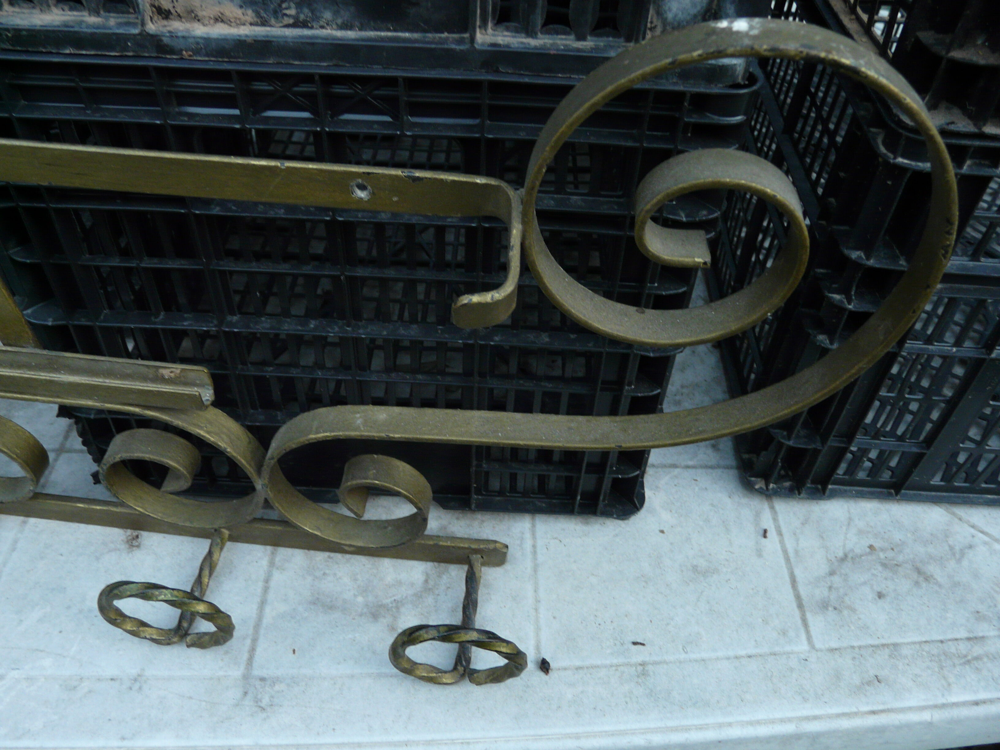 Wall mounted wrought iron coat rack from the 1970s