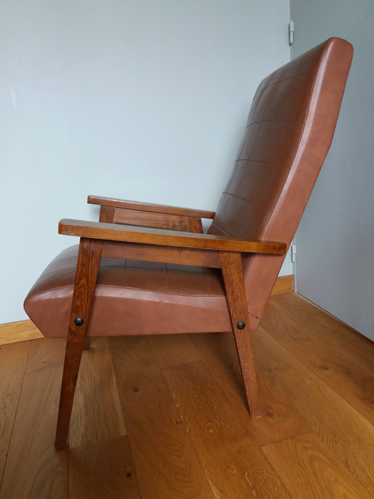 Scandinavian armchair in brown leatherette and wood